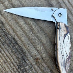 Fossilized Woolly Mammoth Kershaw Leek w Plain Blade in Ivory & Grey | Yellowstone Spirit and Spirit Animal Collection Collectible Knives Santa Fe Stoneworks 