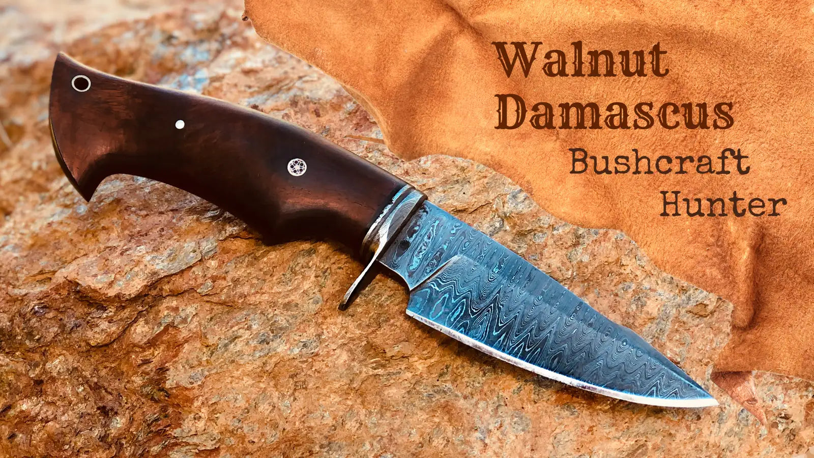 Walnut damascus bushcraft hunter knife with a dark brown handle and blue steel blade.